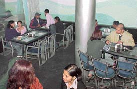Friends enjoy a gourmet meal at Piccadily’s Blue-Ice, Sector 17