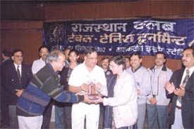 Former table tennis international Indu Puri honouring Rajasthan Club president Govind Kedia and convenor J P Modi at the prize distribution function