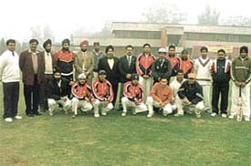 DDCA joint secretary Sunil Khanna and Guru Gobind Singh College principal Dr Jaspal Singh with the participating teams before the inaugural match