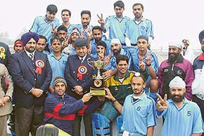 The Ludhiana hockey team poses with the trophy after winning the Prithipal Singh Punjab State Senior Hockey Championship 