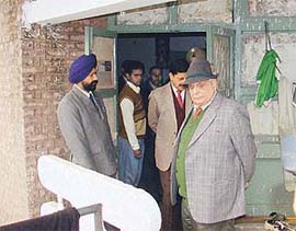UT Administrator Lieut-Gen J.F.R. Jacob (retd) takes a look at the balcony of a hostel room at Government Polytechnic in Chandigarh