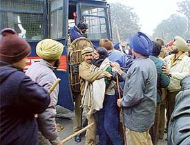 Activists of the Central Trade Union of Chandigarh who were arrested by the police at the Tribune Chowk