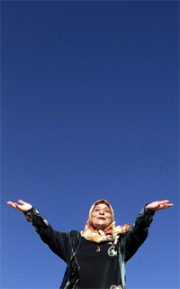 A Palestinian woman calls to the gods to help her pass the Israeli checkpoint