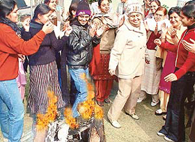 Former UT Advisor Neeru Nanda dances with students of Dev Samaj College