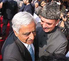 Jammu and Kashmir Chief Minister Mufti Sayeed and Jammu and Kashmir PCC president Ghulam Nabi Azad greet each other