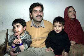 Iftikhar Geelani, Kashmir Times journalist, with family members after his release in New Delhi