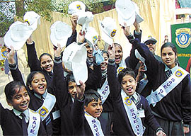 Save Oil drive: Schoolchildren during an inaugural function of Oil Conservation Fortnight 2003 in the Capital 
