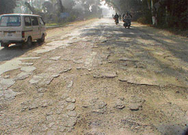 Potholes mark the Mullanpur-Raikot road near Halwara