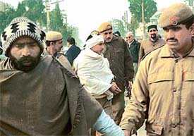 The police rounds up a few persons caught casting fake votes
