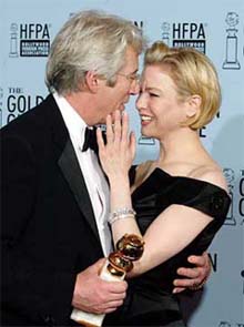 Richard Gere hugs Renee Zellweger after they won the Golden Globe awards for their roles in Chicago at the 60th Annual Golden Globe Awards in Beverly Hills, California