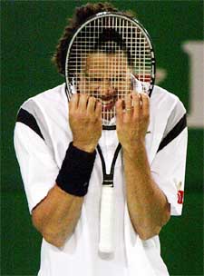 Younes El Aynaoui of Morocco reacts after missing a point during his quarterfinal match against Andy Roddick 