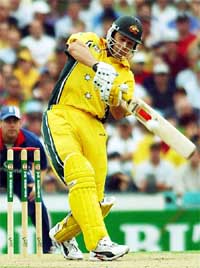 Australias Adam Gilchrist hits a boundary in the first one-day final against England in Sydney