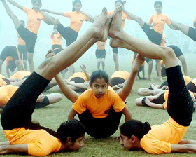 Children rehearse yoga skills