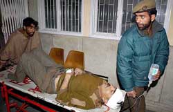A policeman being taken to a hospital in Srinagar