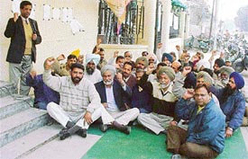 BSNL employees stage a dharna at the GMT office in Ludhiana on Wednesday