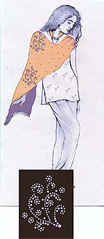 A short kurta with a Chinese band V-neck is teamed here with straight pants and a matching shawl embellished with crystals