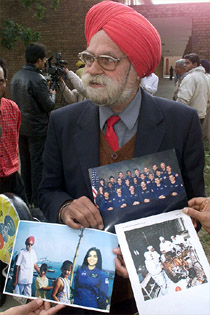 Indian Professor V.S. Malhotra displays photographs of Indian born Aerospace engineer Kalpana Chawla