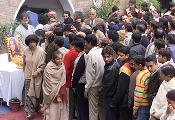 People attend a prayer meeting for Kalpana Chawla in Karnal on Sunday.