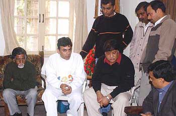 Sanjay Chawla, brother of Kalpana Chawla,with relativesat his residence in New Delhi on Sunday.