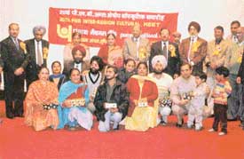 Mr U.S. Bhargava, General Manager, Punjab National Bank, with the winning team at the 20th inter-region cultural meet 