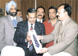 DDCA vice-president C K Khanna presenting a tie to Police Commissioner R. S Gupta, as senior officials Dr S. S. Sareen and Anil Khanna look on