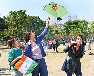 Girl students fly kites at the Students’ Centre of Panjab University in Chandigarh on Wednesday.