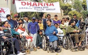 Activists of the Disabled Rights Group protesting against the private sector