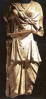 Draped female figure in white marble. Greece, 1BC