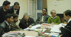 Hamirpur SDM-cum-assistant returning officer Vijay Chandan gives the final touches to the symbols of candidates 