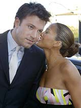 Actor Ben Affleck, star of the new action film "Daredevil," listens to his fiance