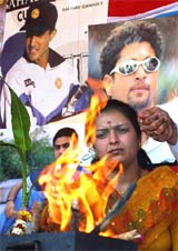 Housewife Priti Chandan performs a prayer ritual