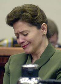 Clara Harris sits at the defense table as the prosecution presents closing arguments to the jury 