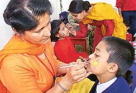 Students of Yadavindra Public School get their faces painted at the two-day annual fete of the school in SAS Nagar