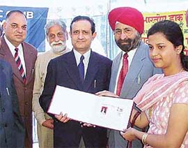 A special cover dedicated to Kalpana Chawla at a function organised at General Post Office in Ludhiana