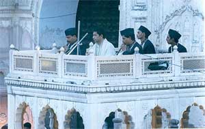 Musicians perform in an enclosure of the Quila Mubarak