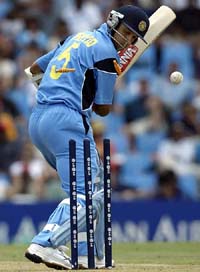 India's Rahul Dravid looks back at his stumps after being bowled for one by Australia's Jason Gillespie 