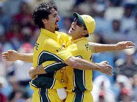 Australia's Jason Gillespie celebrates with captain Ricky Ponting after dismissing India's Sachin Tendulkar 