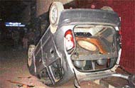 The damaged car, allegedly belonging to Satish Naggar, one of the accused in Saturdays violence at the Civil Hospital