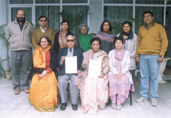 The Principal of Mira Model School and staff after getting the ISO certification