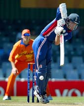 England's Nick Knight takes to his toes as Holland's Daan Van Bunge looks on 