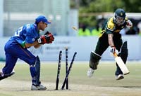 Pakistan's Saqlain Mushtaq is run out by Namibia's wicketkeeper Melt van Schoor 