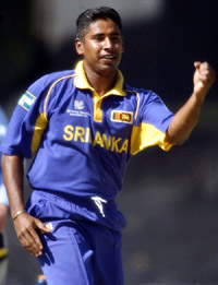 Sri Lankan bowler Chaminda Vaas celebrates after dismissing Canada's Desmond Chumney