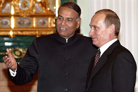 Russian President Vladimir Putin welcomes Indian Minister for External Affairs Yashwant Sinha 