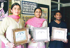Ms Jaskanwal Sohi, Ms Anjali and Mr Karamjit Singh who won first, second and third prize