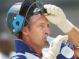 Englands skipper Nasser Hussain takes a drink of water during a practice session