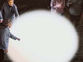 A scene from the video installation "My Sun" by Wang Gong Xin. China, 2001