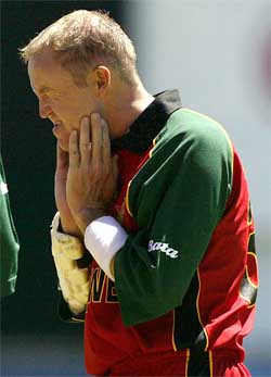 Zimbabwe's Andy Flower wears a white wrist-band as a mark of protest