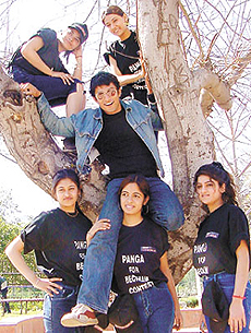 Flanked by beauties, Channel (V) VJ Yudi strikes a pose for shutterbugs for the Panga Challenge at Appu Ghar in the Capital on Tuesday.