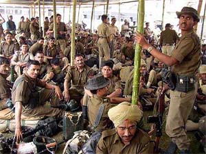 BSF jawans wait at their camp in Agartala