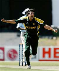 Pakistan's Wasim Akram celebrates after claiming his 500th one-day international wicket